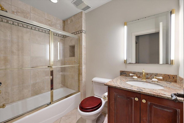 490 E Long Lake Rd, Bloomfield Hills, MI 48304 - full bath with toilet, vanity, combined bath / shower with glass door, and tile patterned floors