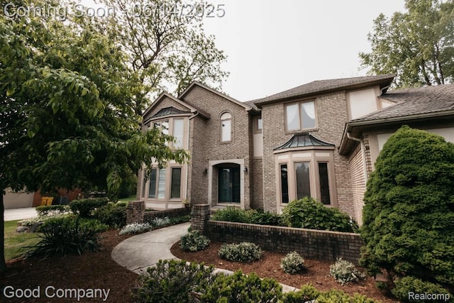 515 Oakbridge Dr, Rochester, MI 48306 - view of front of house with brick siding