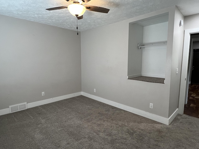 1302 Barnes St, Albion, MI 49224 - spare room featuring a textured ceiling, a ceiling fan, carpet, and baseboards