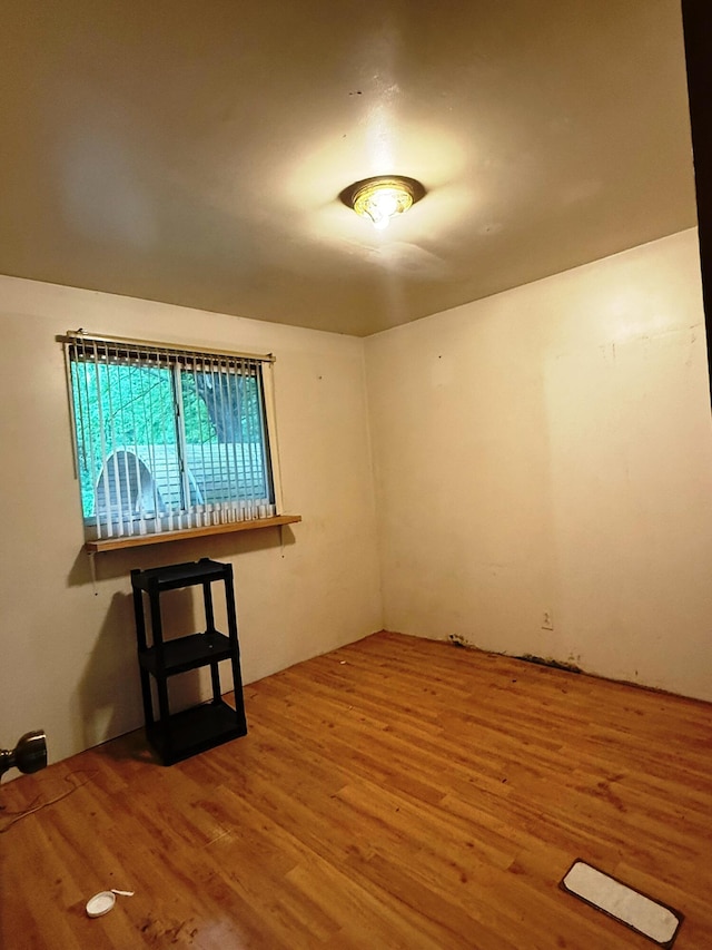 10750 16 Mile Rd NE, Cedar Springs, MI 49319 - unfurnished room with wood finished floors