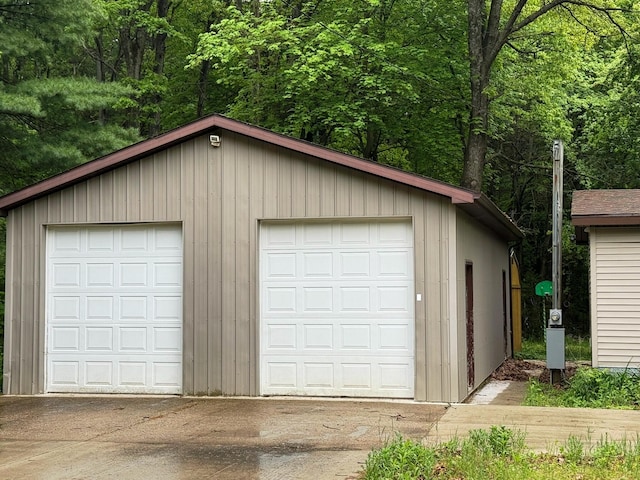 10750 16 Mile Rd NE, Cedar Springs, MI 49319 - detached garage with a view of trees