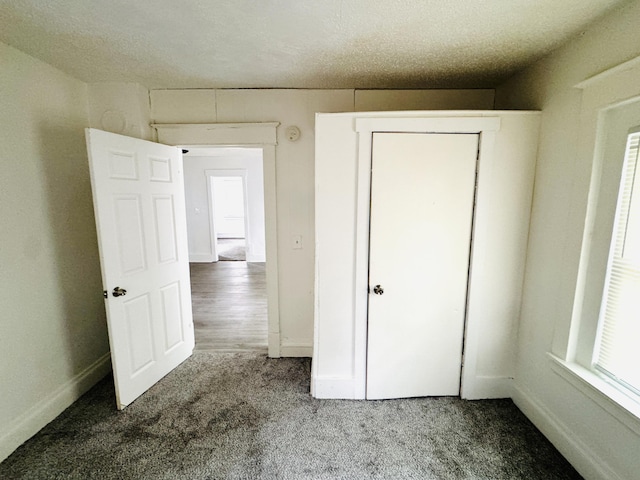 2513 5th St, Muskegon, MI 49444 - unfurnished bedroom with carpet and baseboards