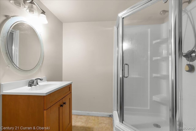 3183 Mildred St, Wayne, MI 48184 - full bath featuring a stall shower, vanity, baseboards, and tile patterned flooring