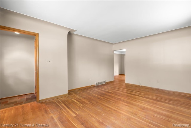 3183 Mildred St, Wayne, MI 48184 - empty room with wood finished floors and baseboards