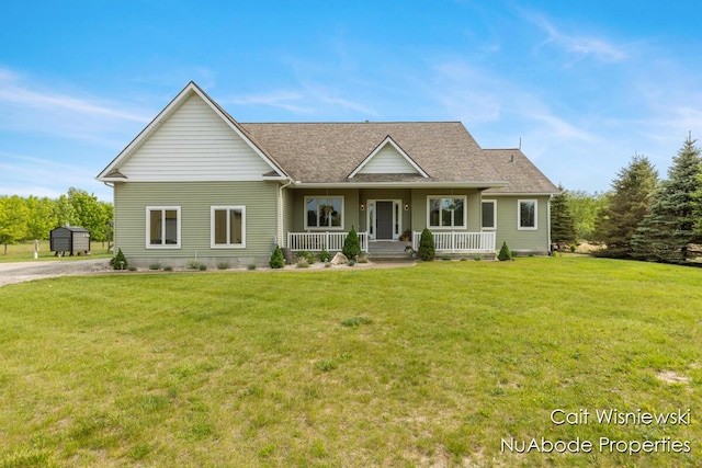 3732 E 128th St, Grant, MI 49327 - traditional-style home featuring covered porch, a front lawn, and roof with shingles