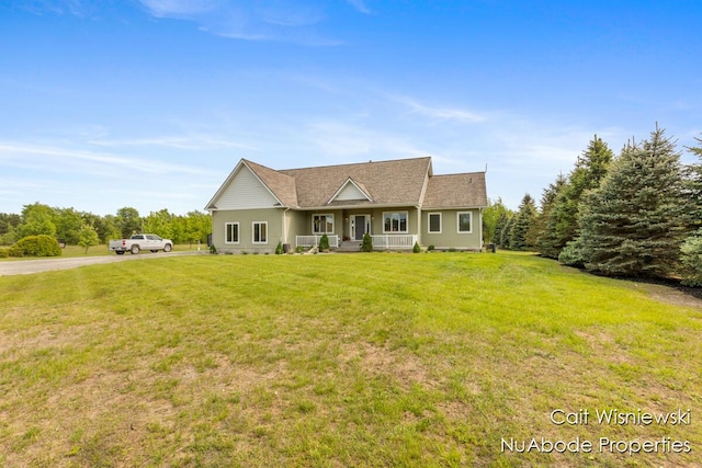 3732 E 128th St, Grant, MI 49327 - view of front of house featuring covered porch and a front yard