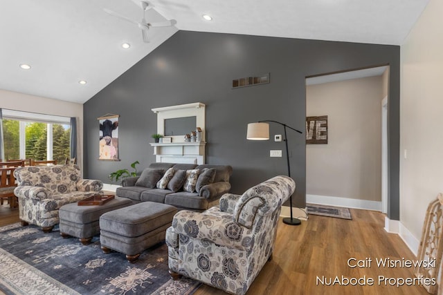 3732 E 128th St, Grant, MI 49327 - living area with wood finished floors, a ceiling fan, baseboards, high vaulted ceiling, and recessed lighting