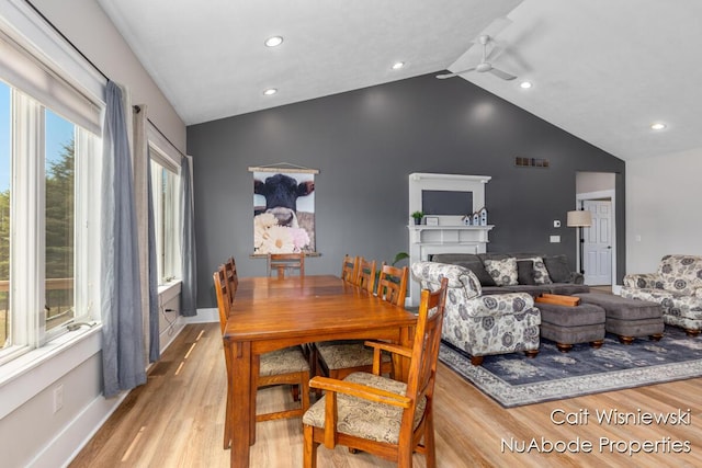 3732 E 128th St, Grant, MI 49327 - dining space with light wood-style floors, recessed lighting, a ceiling fan, baseboards, and high vaulted ceiling