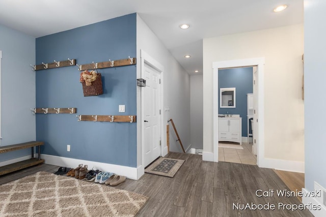 3732 E 128th St, Grant, MI 49327 - foyer featuring wood finished floors, baseboards, and recessed lighting