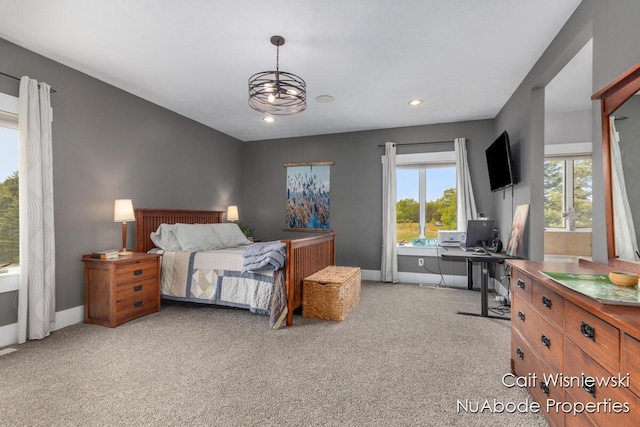 3732 E 128th St, Grant, MI 49327 - carpeted bedroom featuring a desk, baseboards, recessed lighting, and a chandelier