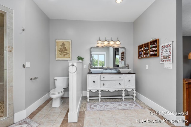 3732 E 128th St, Grant, MI 49327 - bathroom with vanity, tile patterned flooring, toilet, baseboards, and recessed lighting