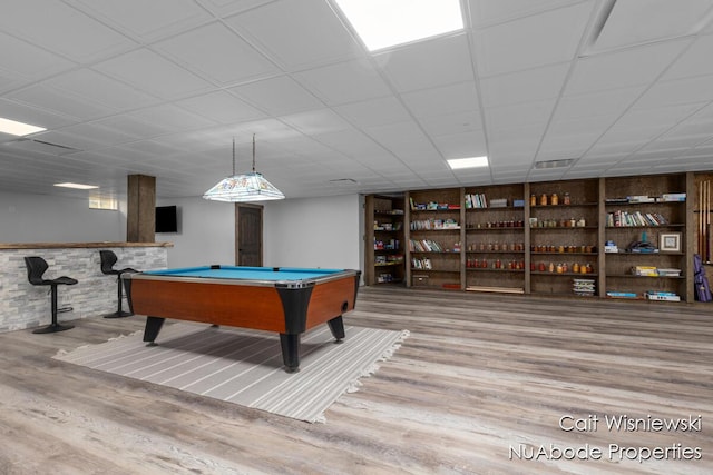3732 E 128th St, Grant, MI 49327 - game room featuring wood finished floors, billiards, and built in features