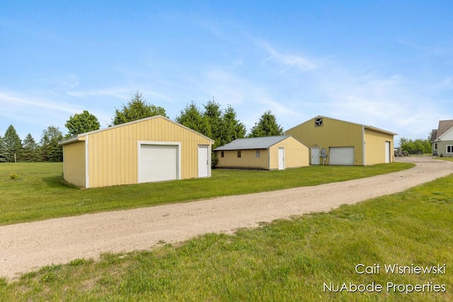 3732 E 128th St, Grant, MI 49327 - detached garage with dirt driveway