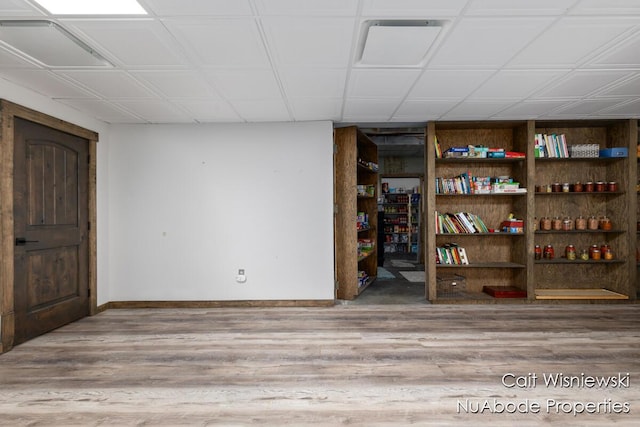 3732 E 128th St, Grant, MI 49327 - finished below grade area featuring wood finished floors and baseboards