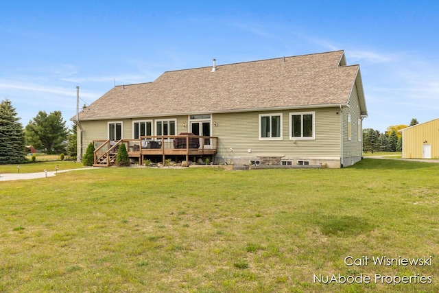 3732 E 128th St, Grant, MI 49327 - back of house with a deck, a yard, and roof with shingles