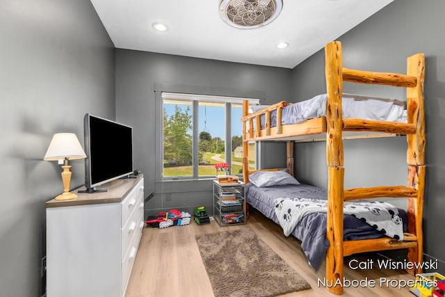 3732 E 128th St, Grant, MI 49327 - bedroom with wood finished floors and recessed lighting