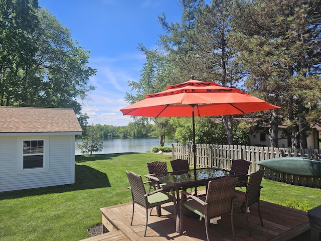 1200 Iroquois Trl, Hastings, MI 49058 - wooden deck with outdoor dining area and a water view