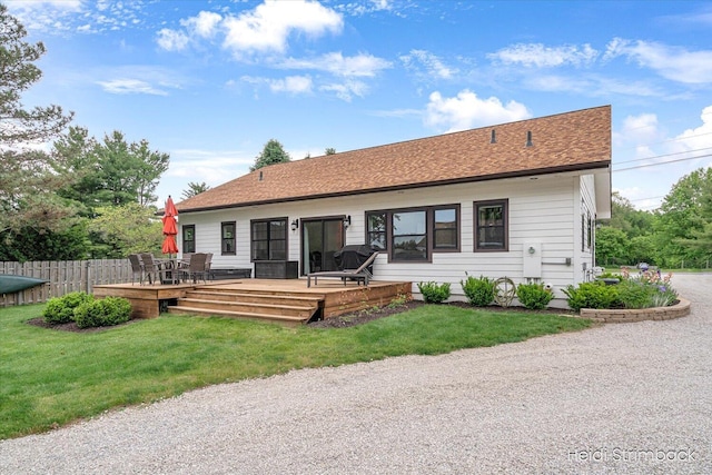 1200 Iroquois Trl, Hastings, MI 49058 - back of property featuring a deck