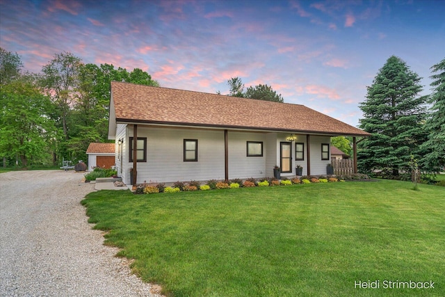 1200 Iroquois Trl, Hastings, MI 49058 - ranch-style home with a lawn, a porch, and driveway