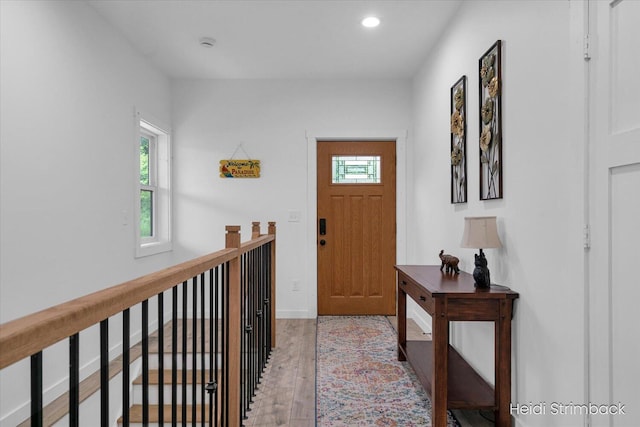 1200 Iroquois Trl, Hastings, MI 49058 - foyer entrance featuring plenty of natural light, light wood-style flooring, recessed lighting, and baseboards