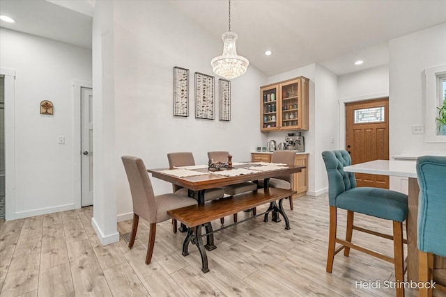 1200 Iroquois Trl, Hastings, MI 49058 - dining room featuring light wood-style floors, a chandelier, recessed lighting, and baseboards