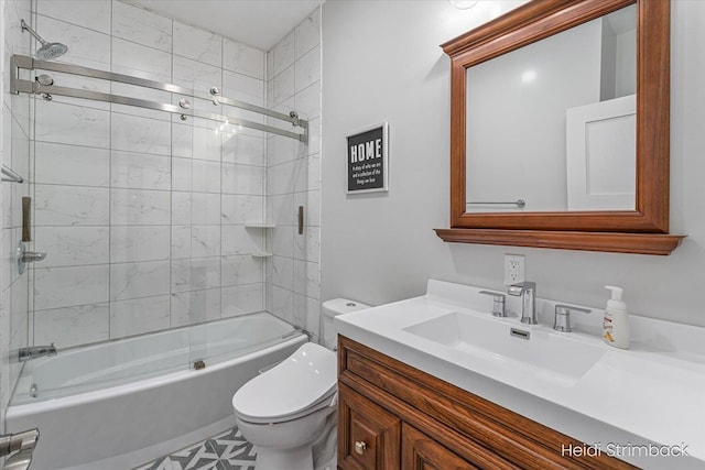 1200 Iroquois Trl, Hastings, MI 49058 - bathroom featuring toilet, vanity, and tub / shower combination