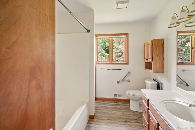 321 Myers Rd, Lapeer, MI 48446 - full bath featuring healthy amount of natural light, wood finished floors, toilet, and vanity