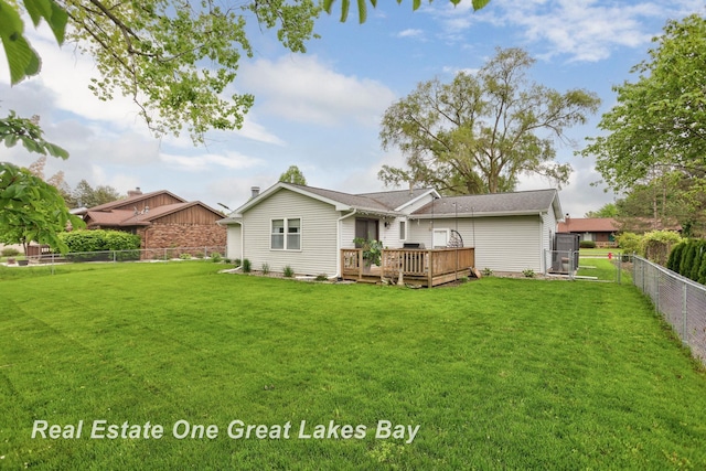 4936 Frontier Ln, Saginaw, MI 48603 - back of house with a wooden deck