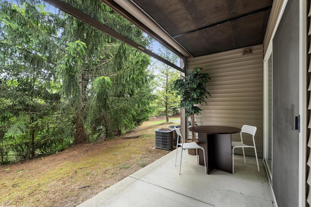 28067 Carlton Way Dr, Novi, MI 48377 - view of patio featuring central AC