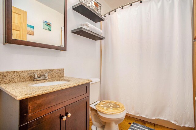 283 S Fremont Rd, Coldwater, MI 49036 - bathroom with toilet and vanity