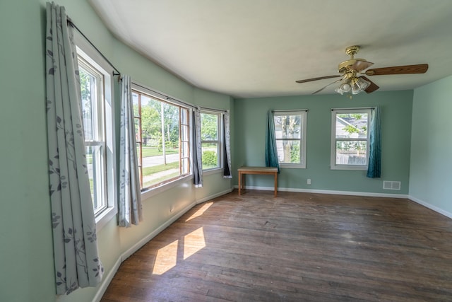 428 Orchard Ave, Muskegon, MI 49442 - spare room with wood finished floors, baseboards, and ceiling fan