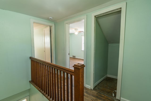 428 Orchard Ave, Muskegon, MI 49442 - corridor featuring wood finished floors, an upstairs landing, and baseboards