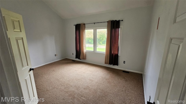 540 Clairpointe Woods Dr, Detroit, MI 48215 - carpeted empty room with lofted ceiling and baseboards