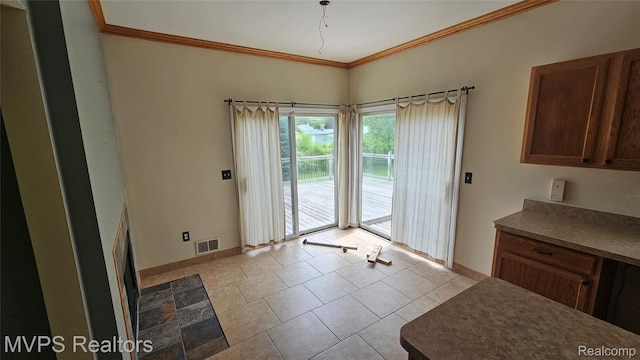 540 Clairpointe Woods Dr, Detroit, MI 48215 - dining area featuring ornamental molding, baseboards, and tile patterned floors