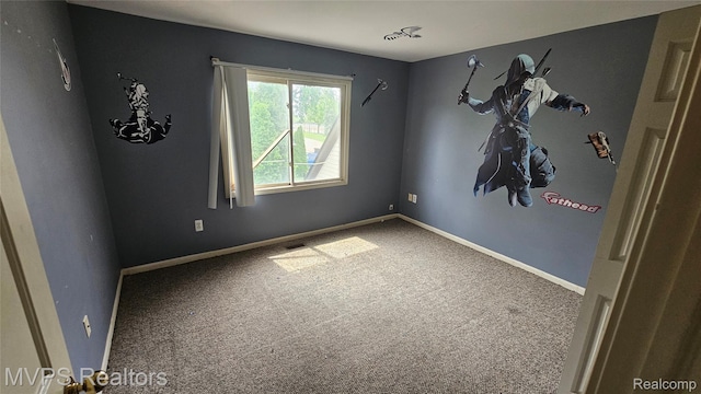 540 Clairpointe Woods Dr, Detroit, MI 48215 - carpeted empty room with baseboards