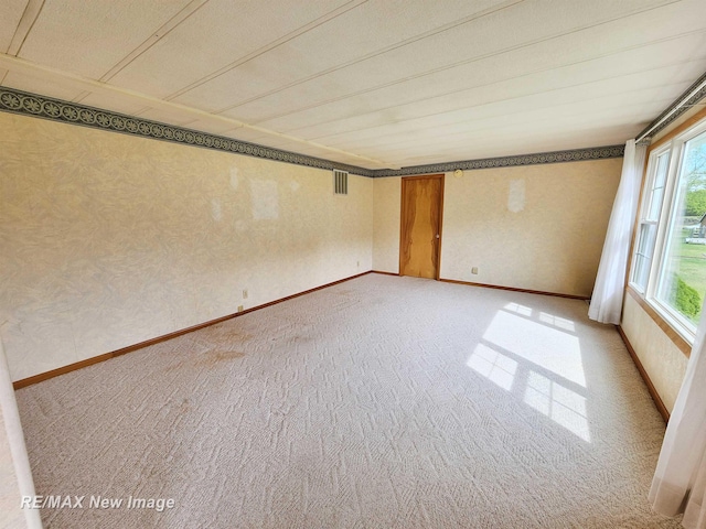 10424 S Graham Rd, Saint Charles, MI 48655 - unfurnished room featuring light colored carpet and baseboards