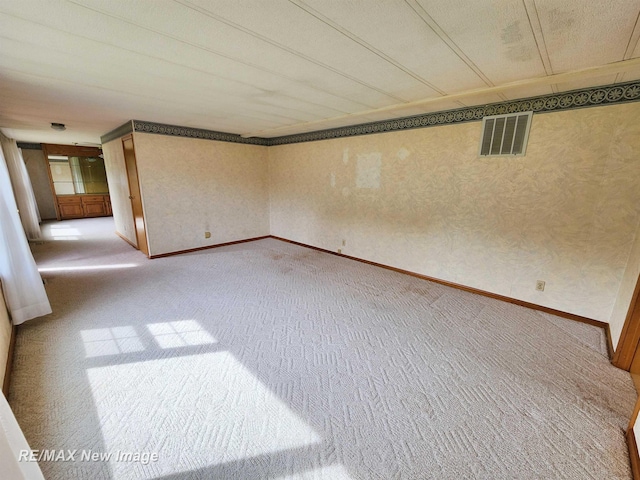 10424 S Graham Rd, Saint Charles, MI 48655 - carpeted empty room with baseboards