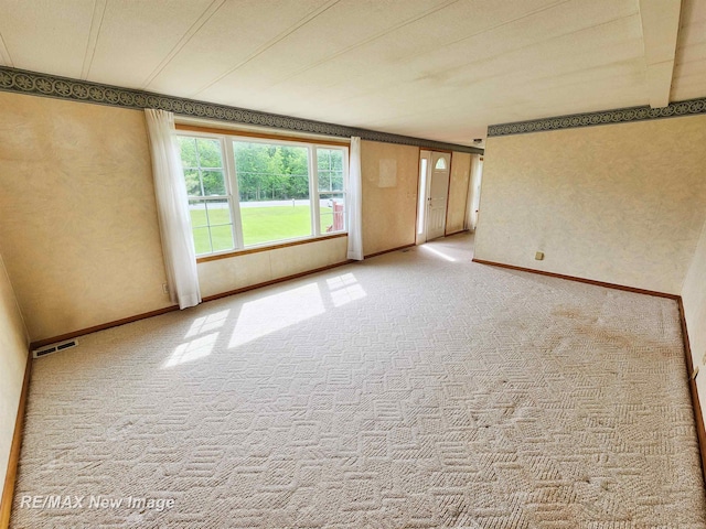 10424 S Graham Rd, Saint Charles, MI 48655 - carpeted empty room with baseboards