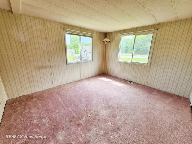 10424 S Graham Rd, Saint Charles, MI 48655 - carpeted spare room featuring wallpapered walls