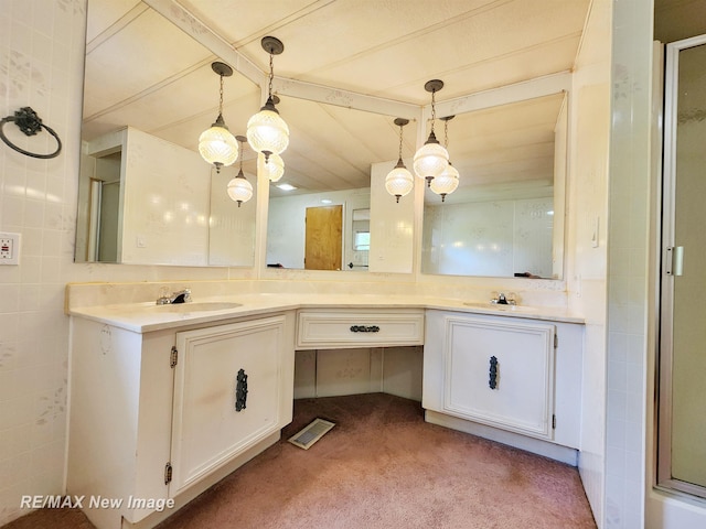 10424 S Graham Rd, Saint Charles, MI 48655 - bathroom featuring double vanity and a shower with shower door