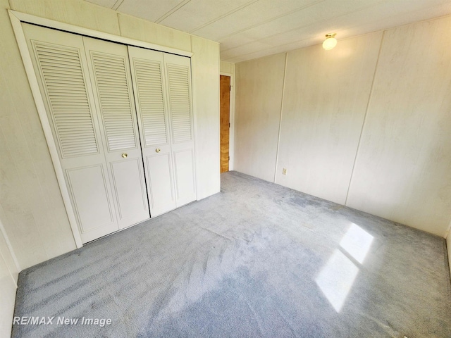 10424 S Graham Rd, Saint Charles, MI 48655 - unfurnished bedroom with carpet flooring and a closet