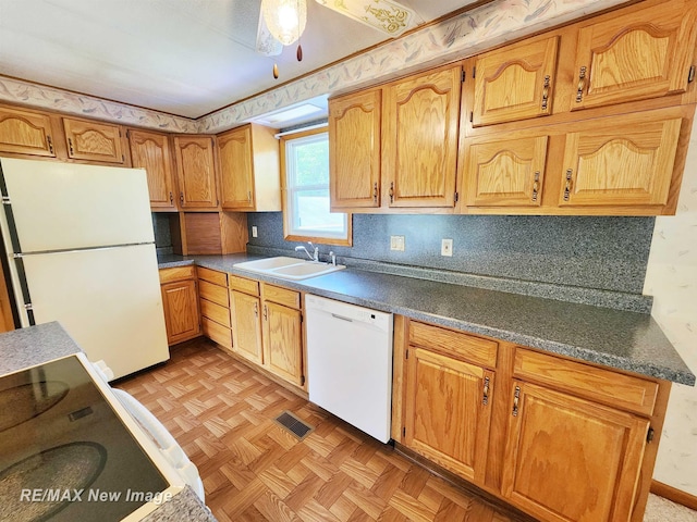 10424 S Graham Rd, Saint Charles, MI 48655 - kitchen with white appliances, a sink, backsplash, and dark countertops