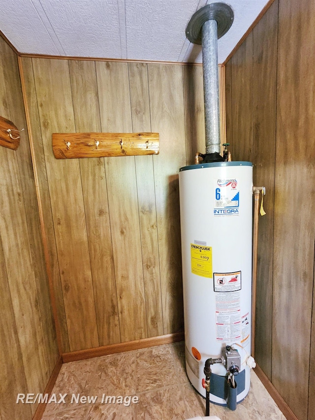 10424 S Graham Rd, Saint Charles, MI 48655 - utility room featuring water heater