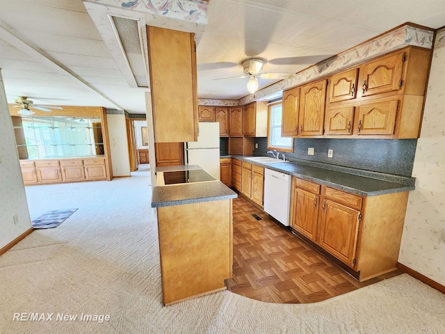 10424 S Graham Rd, Saint Charles, MI 48655 - kitchen with a ceiling fan, white appliances, a sink, baseboards, and wallpapered walls