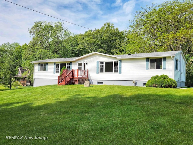 10424 S Graham Rd, Saint Charles, MI 48655 - manufactured / mobile home with a front yard and a deck