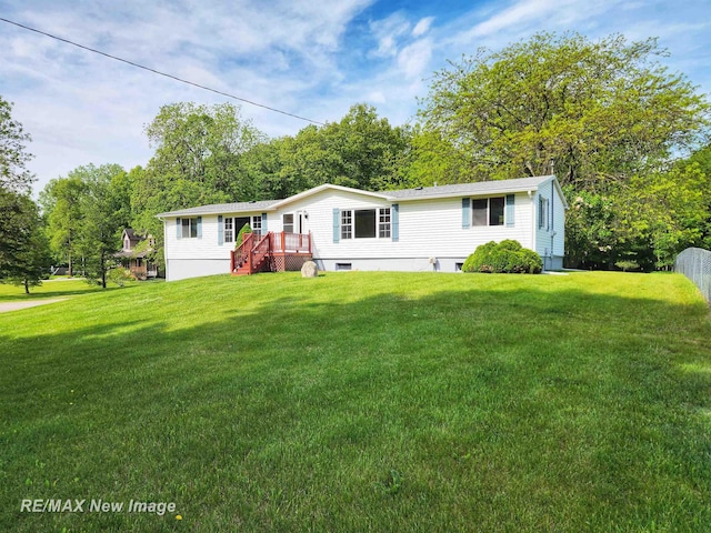 10424 S Graham Rd, Saint Charles, MI 48655 - manufactured / mobile home featuring a front yard and a deck