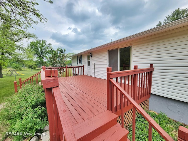 10424 S Graham Rd, Saint Charles, MI 48655 - wooden deck with a lawn