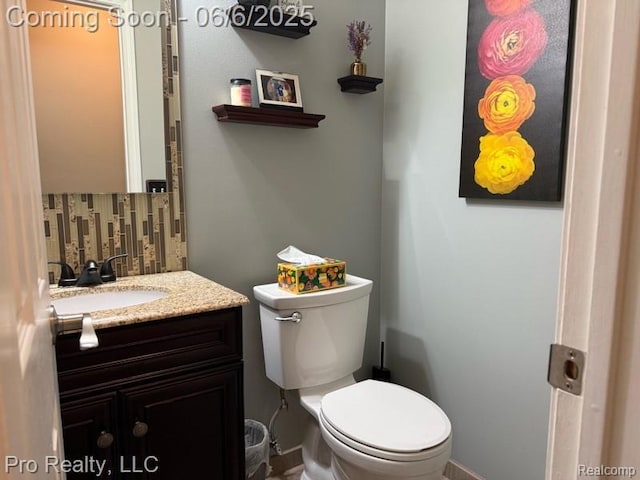 44195 Dartmouth St, Canton, MI 48188 - half bathroom with tasteful backsplash, vanity, and toilet