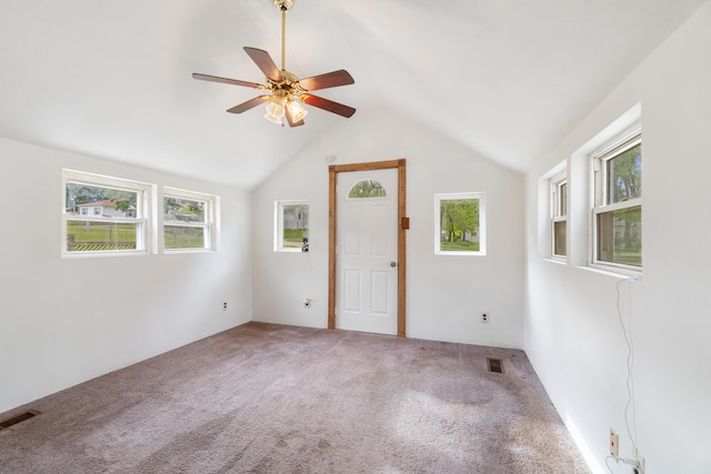 817 Annetta Ave, Jackson, MI 49203 - carpeted empty room featuring a ceiling fan and lofted ceiling