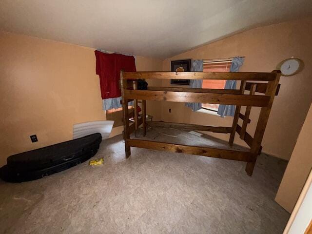 4465 E Old M-63, Luther, MI 49656 - bedroom featuring lofted ceiling and carpet